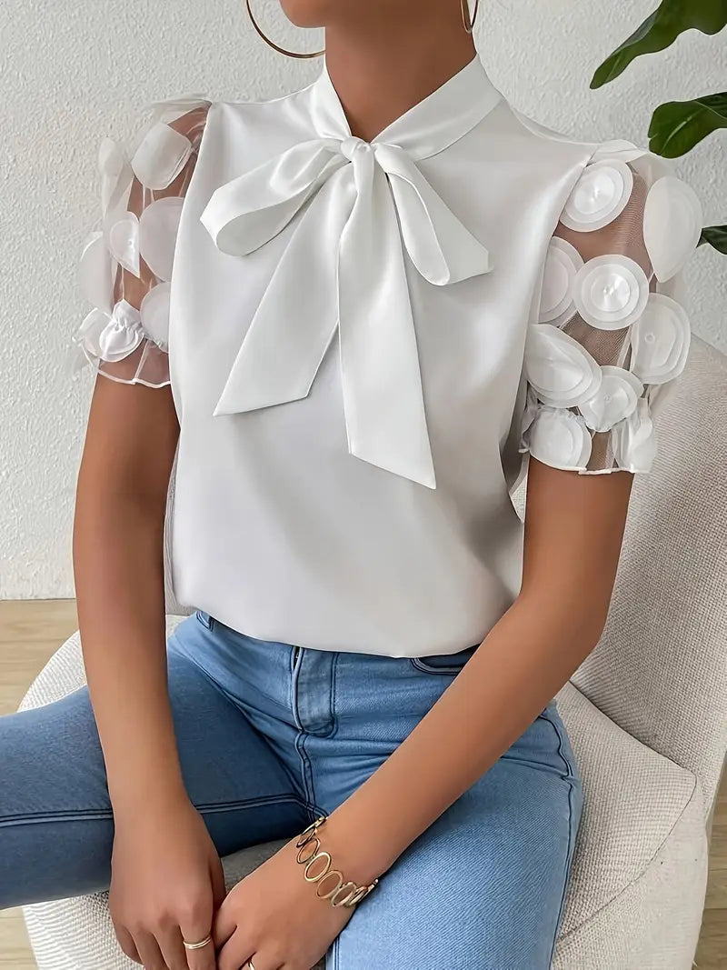 Janie - Blusa elegante con escote de lazo