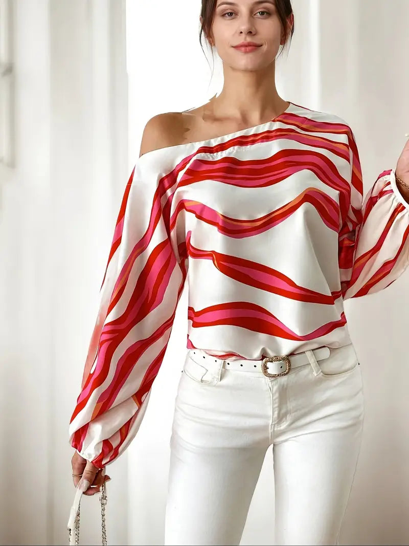 Philomena - Elegante blusa con hombros descubiertos y estampado geométrico.