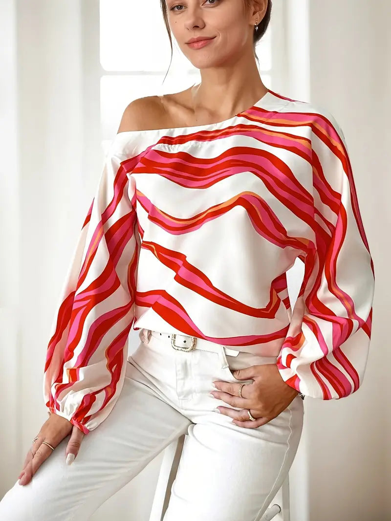 Philomena - Elegante blusa con hombros descubiertos y estampado geométrico.