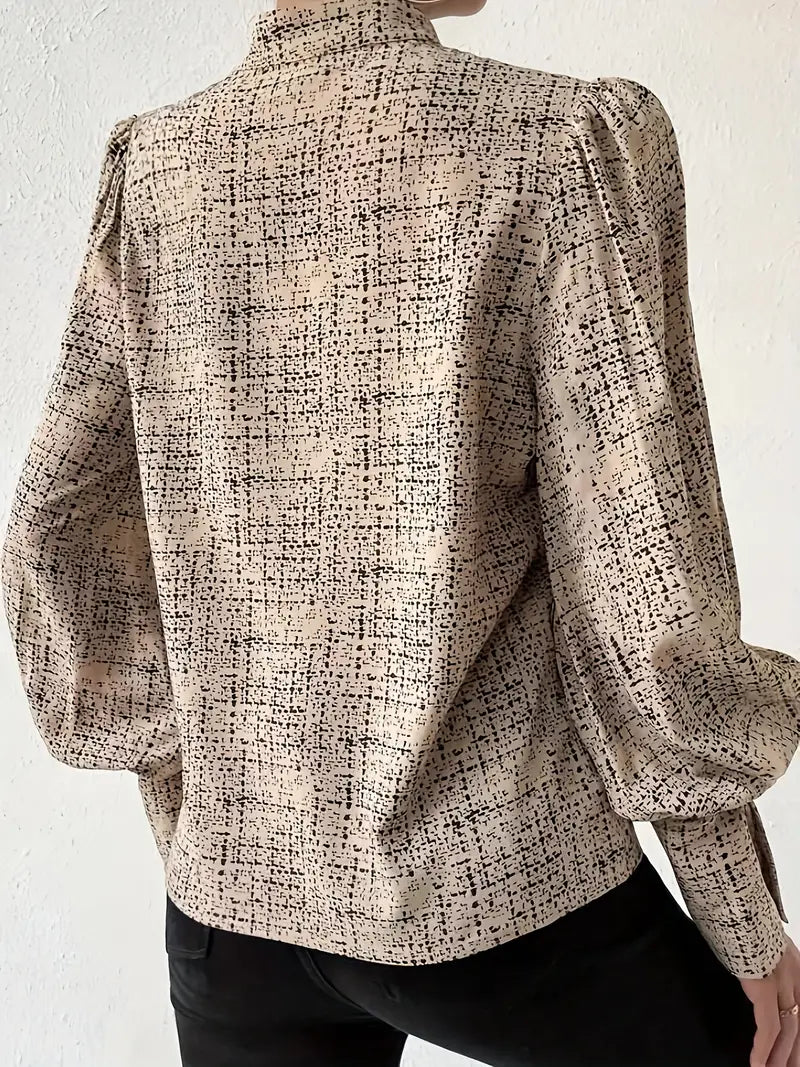 Monica - Blusa con estampado abstracto y ribete de volantes