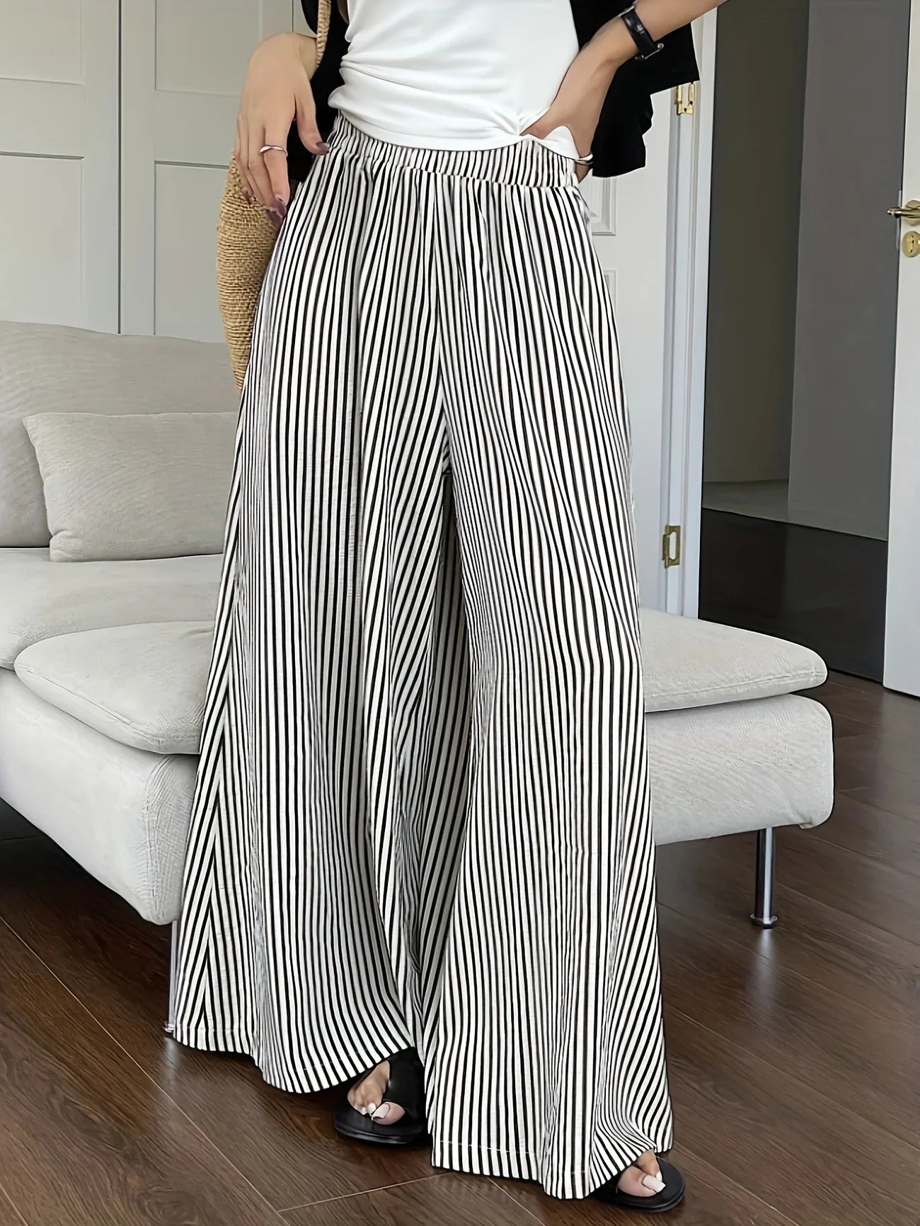 Candida - Pantalones anchos de rayas con bolsillos inclinados