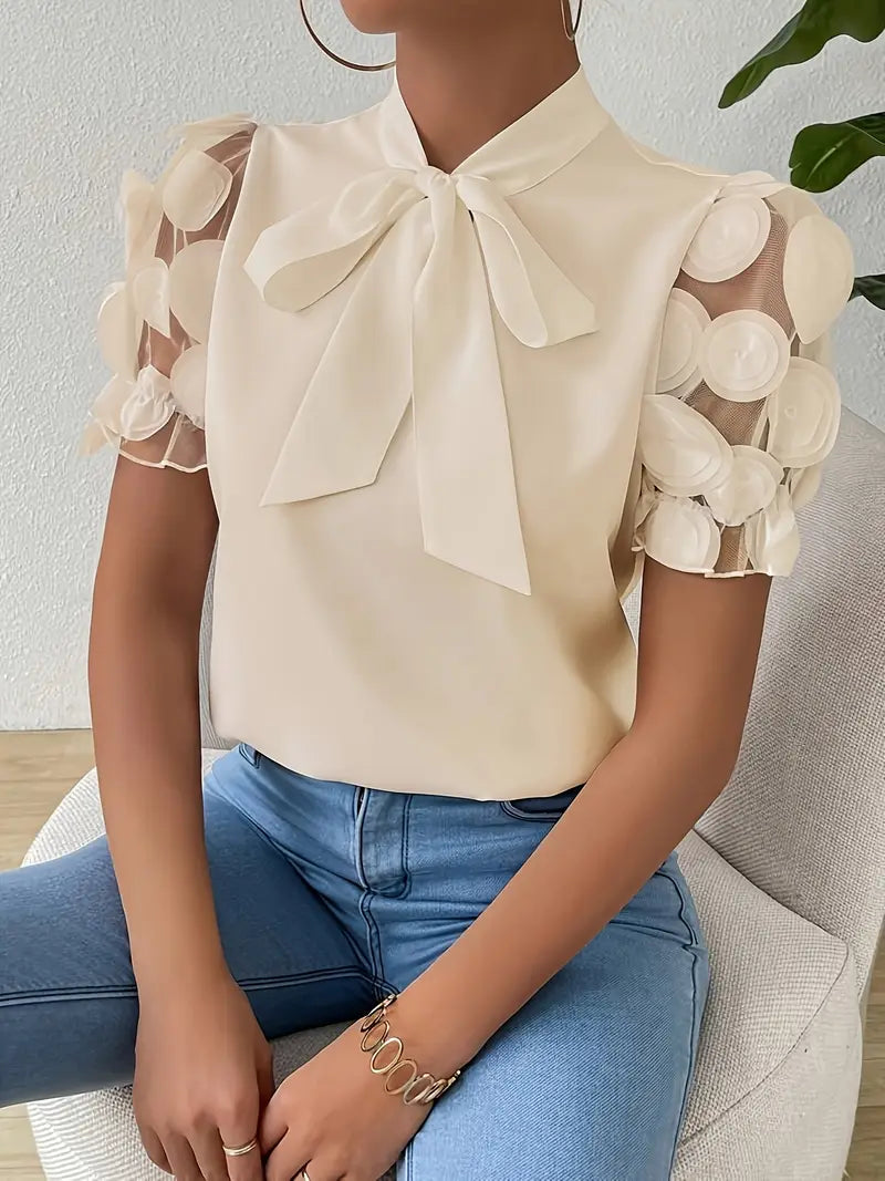 Janie - Blusa elegante con escote de lazo
