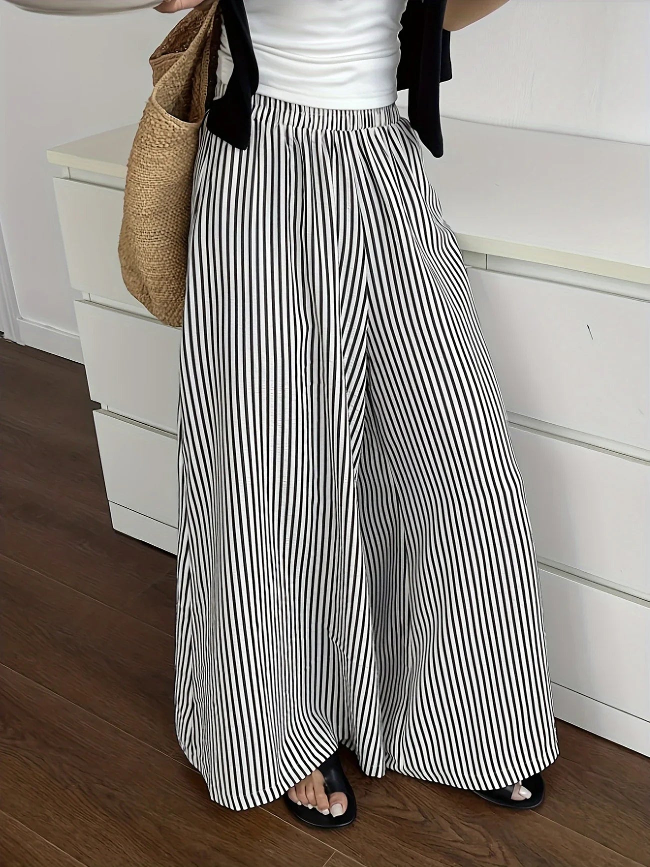 Candida - Pantalones anchos de rayas con bolsillos inclinados