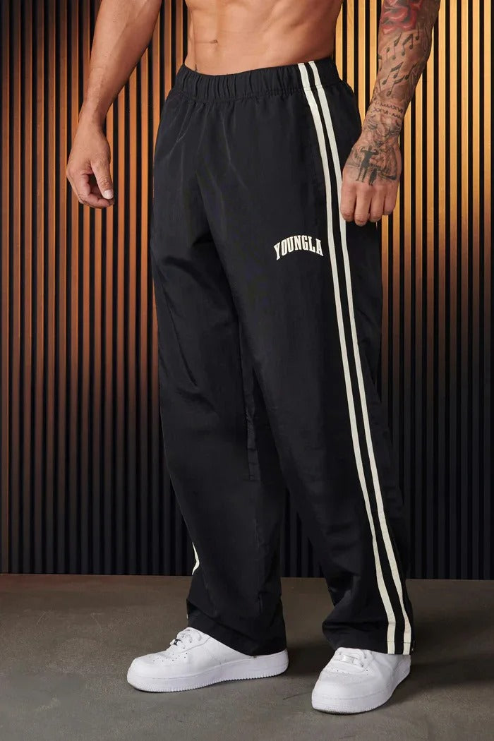Bryan Pantalón deportivo de hombre con estampado de doble raya