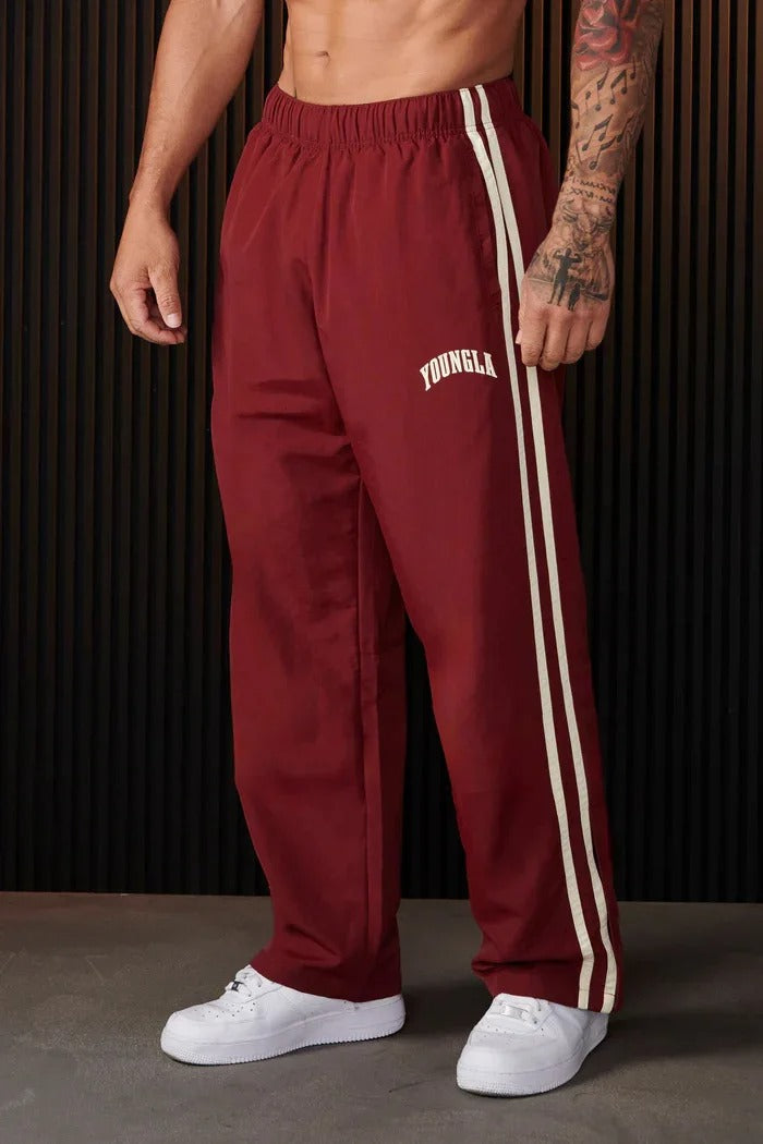 Bryan Pantalón deportivo de hombre con estampado de doble raya